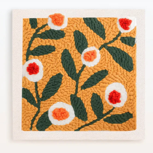 Textured fabric square with floral pattern on a white background