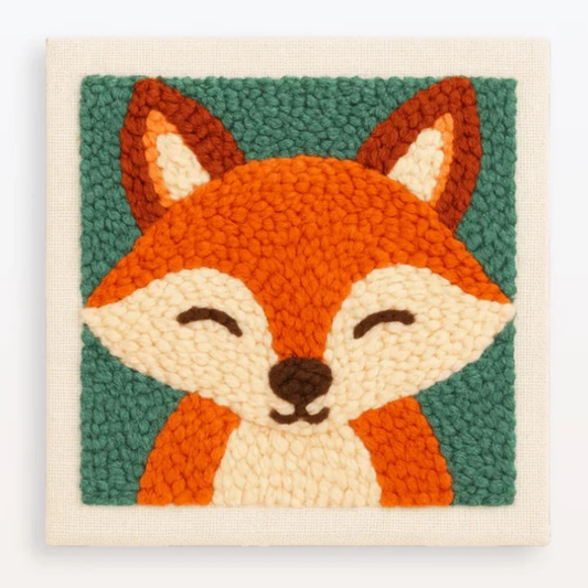 Woven wall art of a fox face with a green background