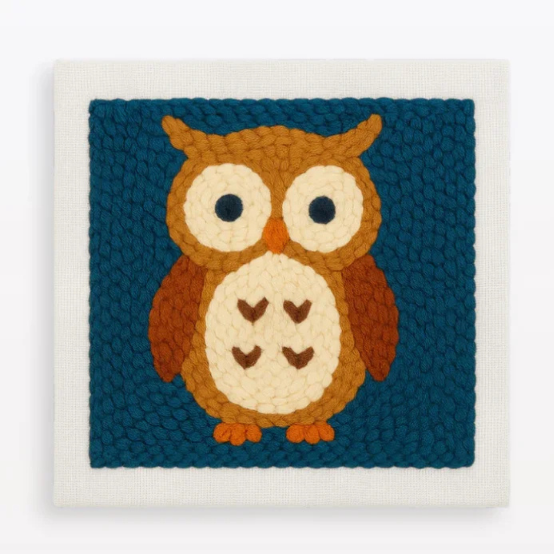 Woven owl design on a blue background with a white border