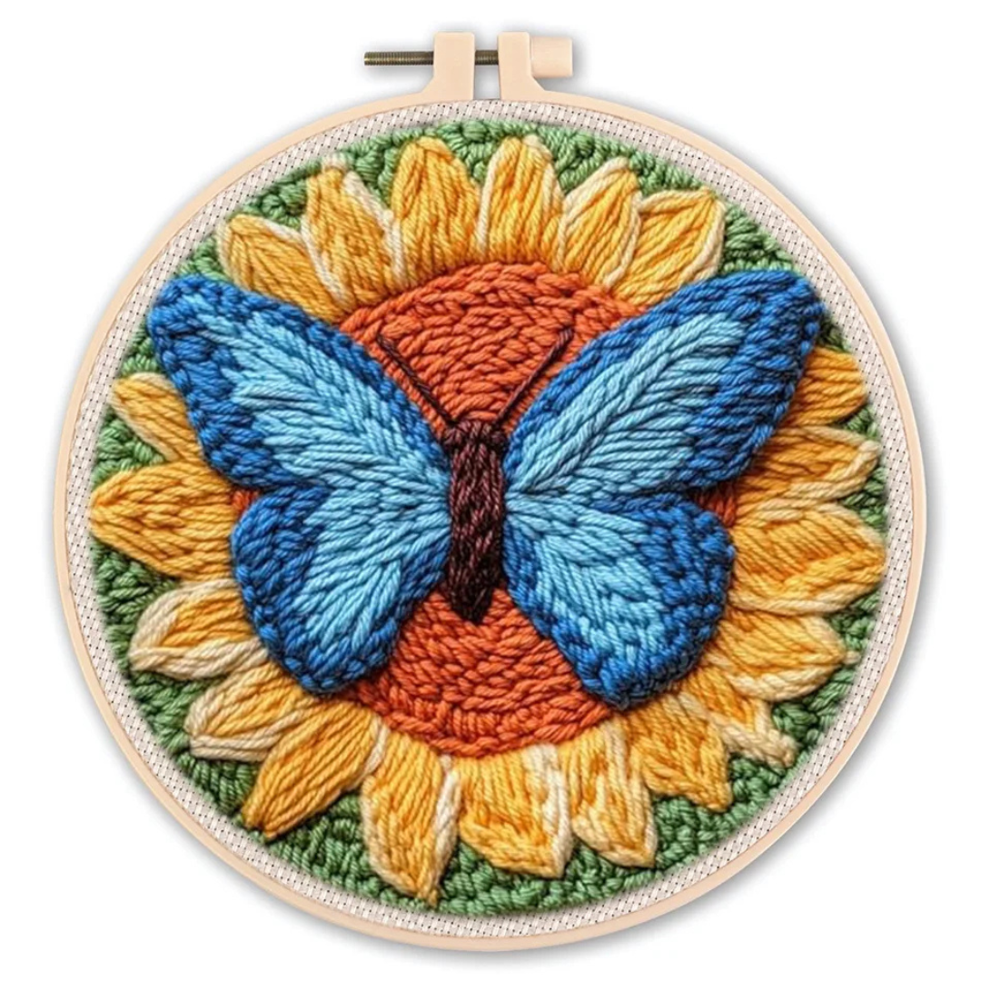 Embroidery hoop with a colorful butterfly and sunflower design.