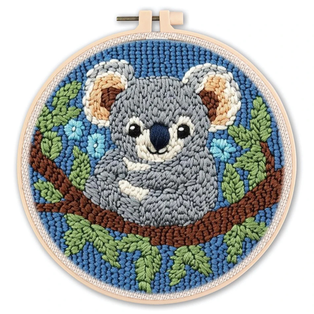 Embroidery hoop with a koala design on a white background