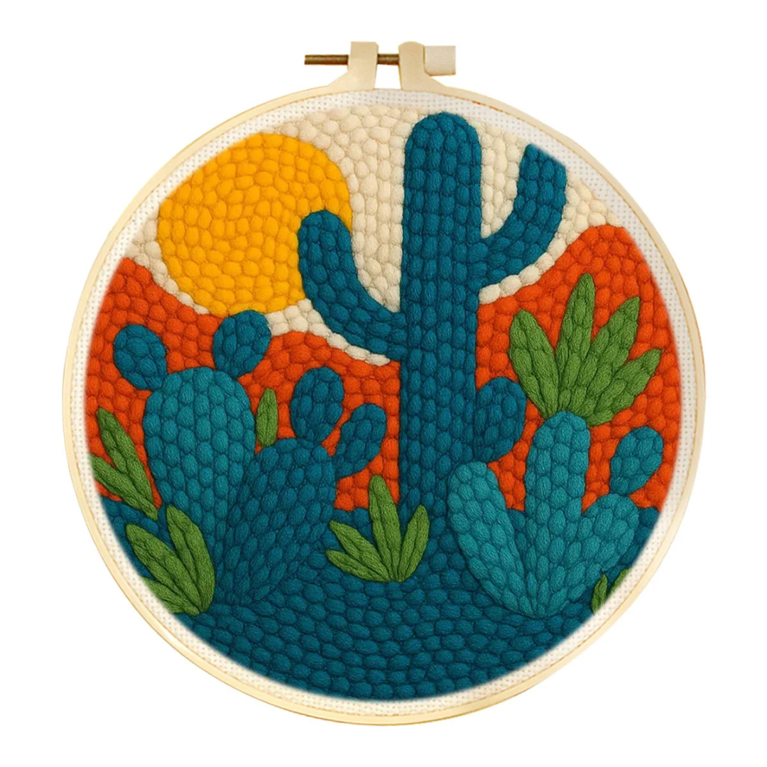 Embroidery hoop with a colorful cactus design on a white background